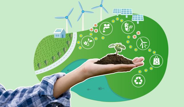 green energy sources wind solar panels biofarms and a hand with soil