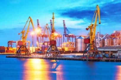 marine port at night marine port with cranes and liquid fuel storage by night